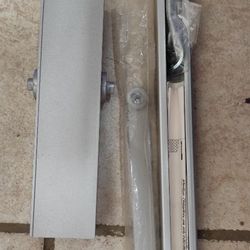 Ferme-porte à glissière argent